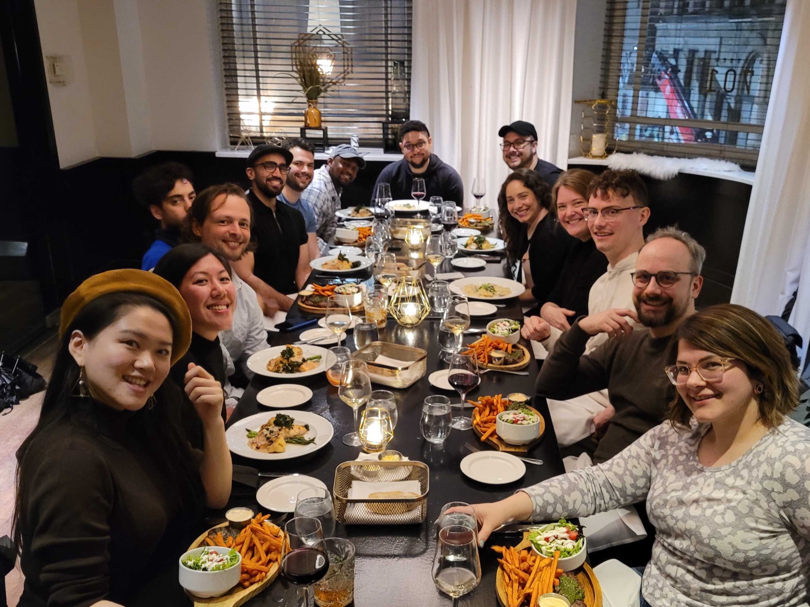A design team dinner around a long table